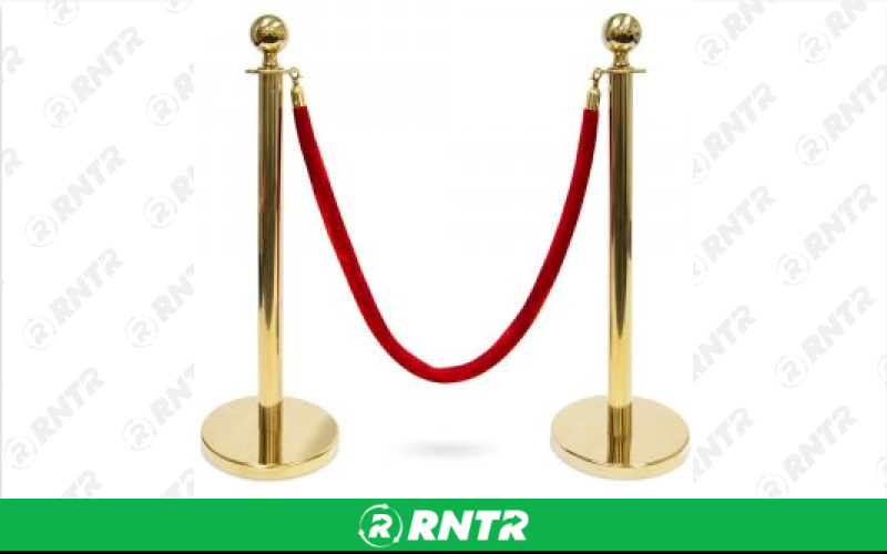 Generic Gold Stanchions w/ Red Rope – For rent in lilburn, georgia – JVC's Party Rentals & Event Hall | RNTR.com – Image 1