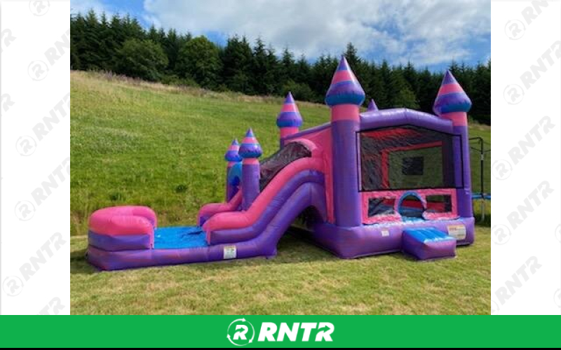 Generic Purple Castle Bounce House with Double Lane Waterslide (31W x 15L) – For rent in vancouver, washington – Bounce-n-Battle | RNTR.com – Image 1