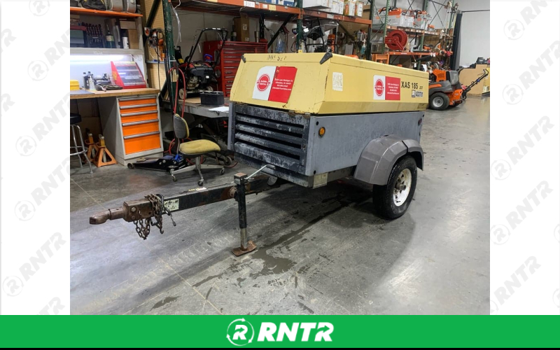 Generic Towable Air Compressor - Hose Seperate- 185 CFM - 2 Ball Yellow – For rent in Allendale, Michigan – Allendale Ace | RNTR.com – Image 1 of 1